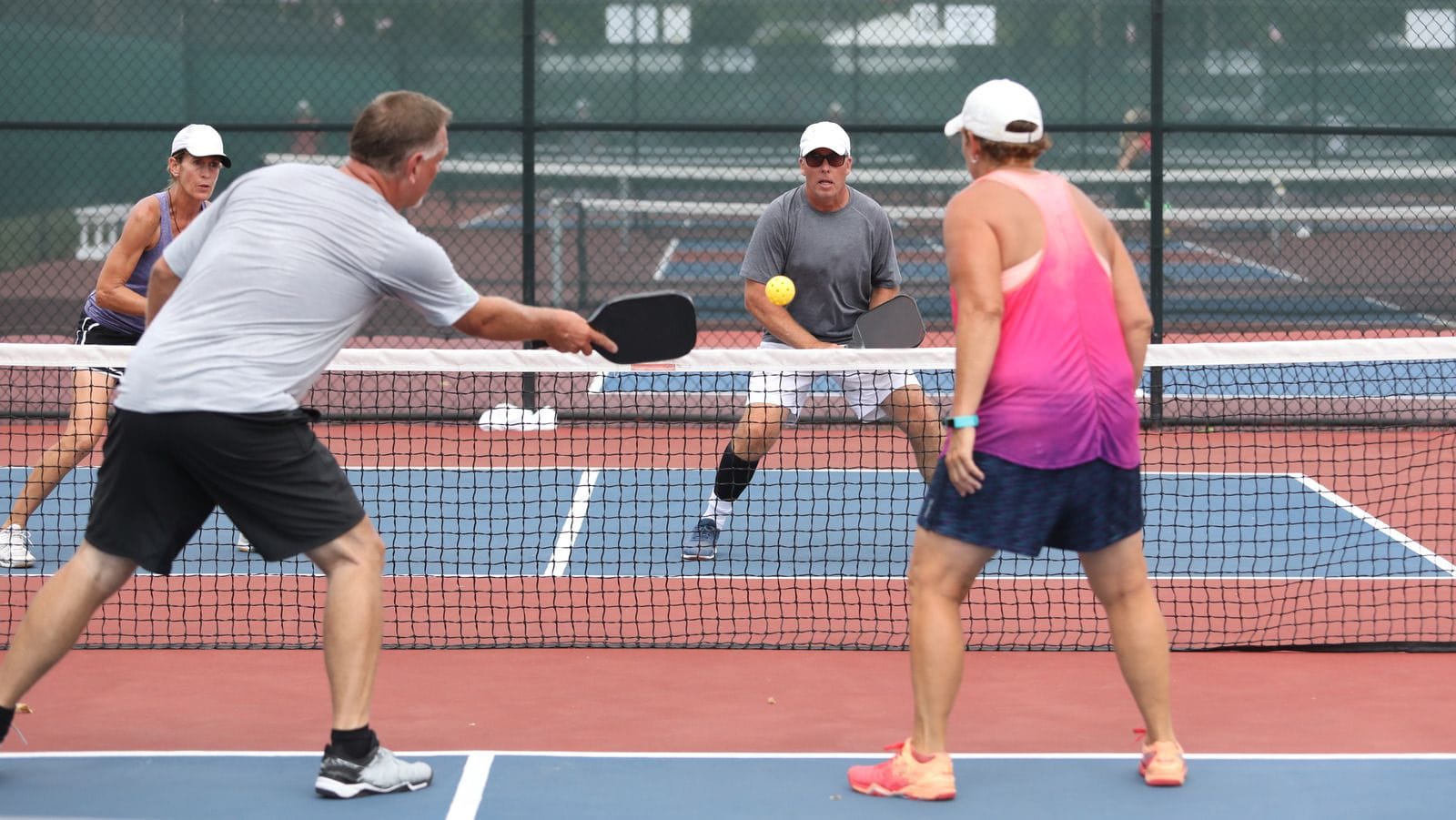 Play tennis or pickleball at Rock Creek Sports Club